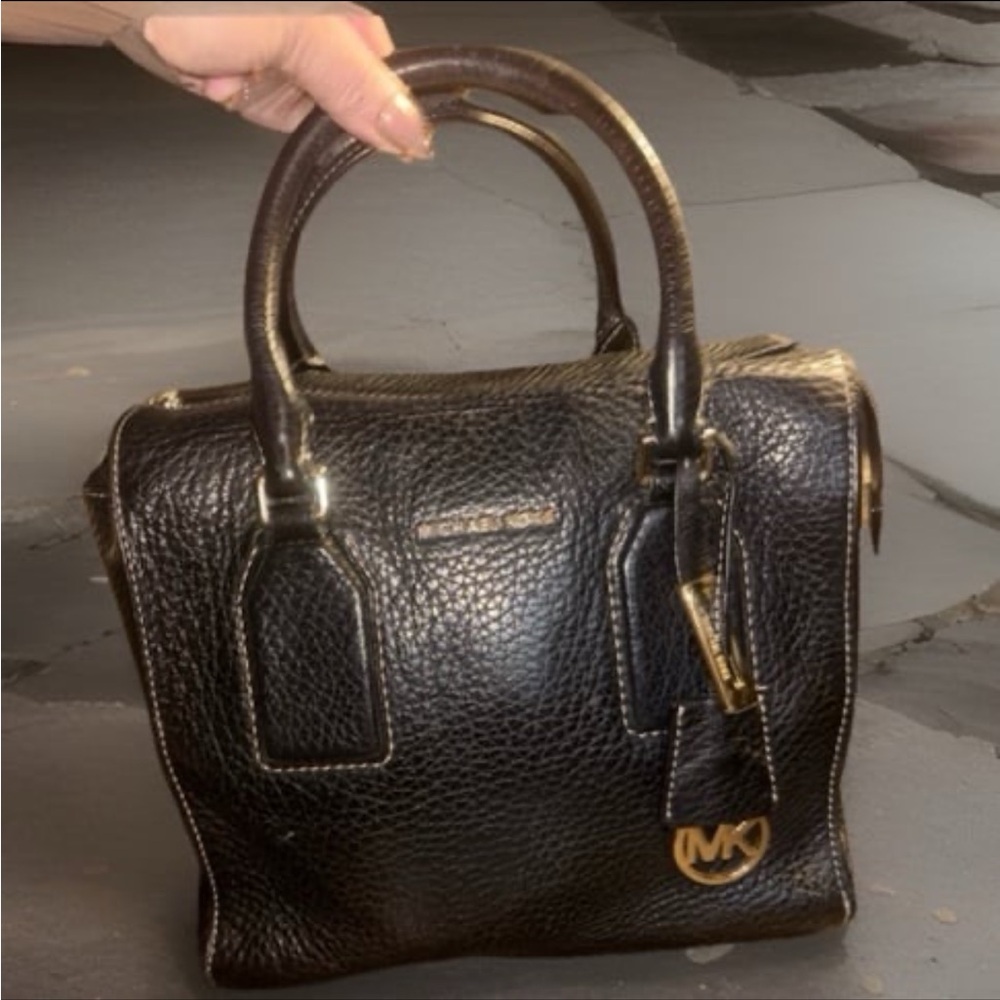 Michael Kors Selby Satchel in black pebbled leather featuring gold hardware